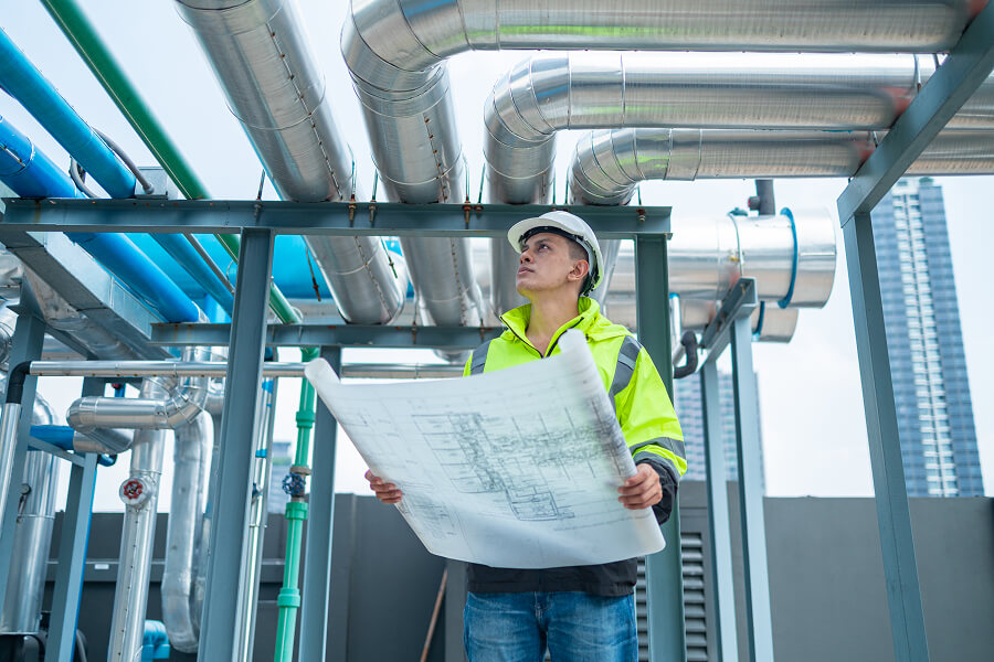 hvac-technician-checking-blueprints.JPG