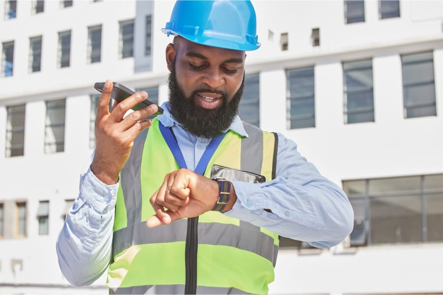 hvac-technician-checking-his-clock-to-arrive-on-time.jpg